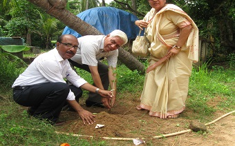 Planting a sapling in Kerala-min